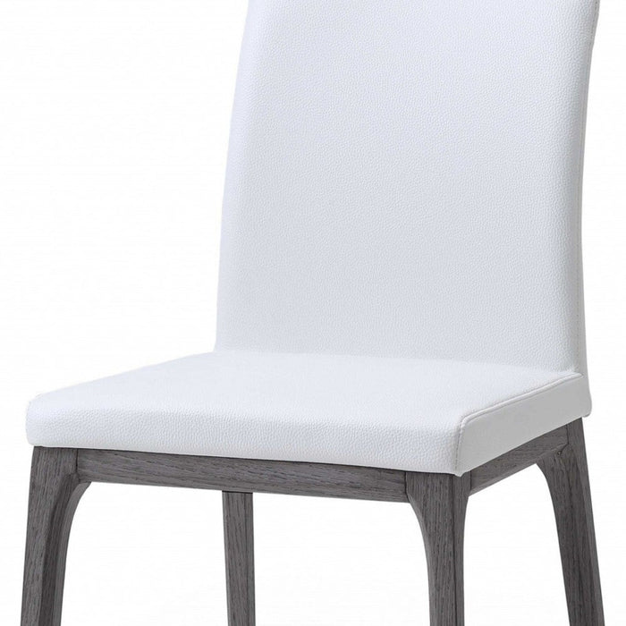 Chic Duo: 2 Faux Leather Dining Chairs by Homeroots